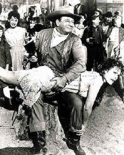 John Wayne spanking woman's bottom